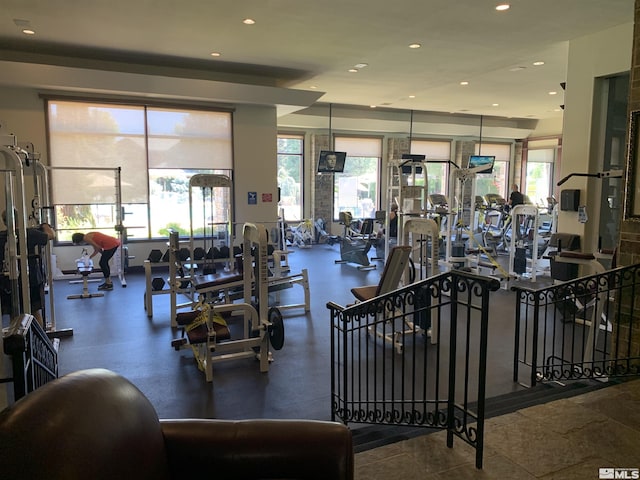 workout area featuring recessed lighting