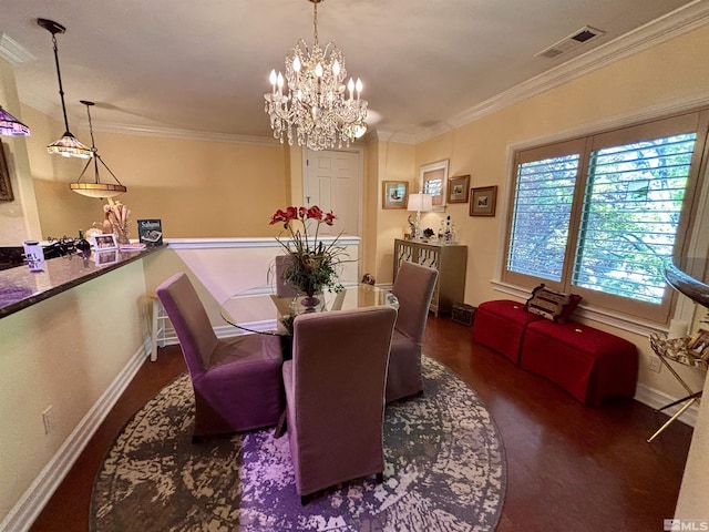 dining space featuring crown molding, baseboards, and visible vents