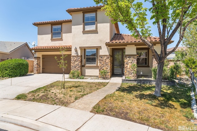 mediterranean / spanish-style home featuring stucco siding, a tiled roof, stone siding, and concrete driveway