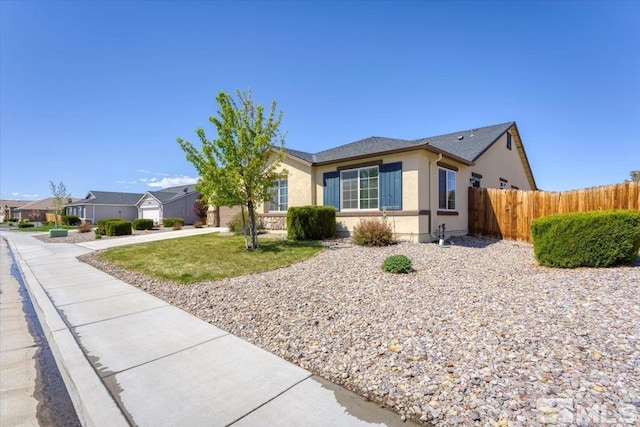 single story home with fence, stucco siding, and driveway