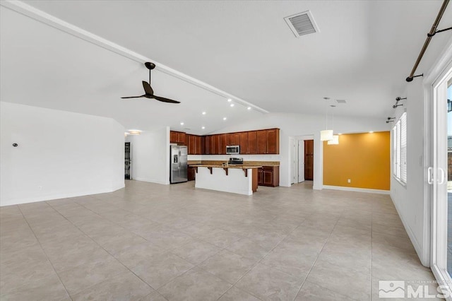 unfurnished living room with a ceiling fan, baseboards, vaulted ceiling with beams, light tile patterned floors, and visible vents