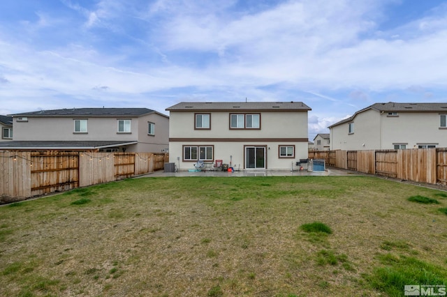 rear view of house featuring central AC, stucco siding, a fenced backyard, a patio area, and a lawn
