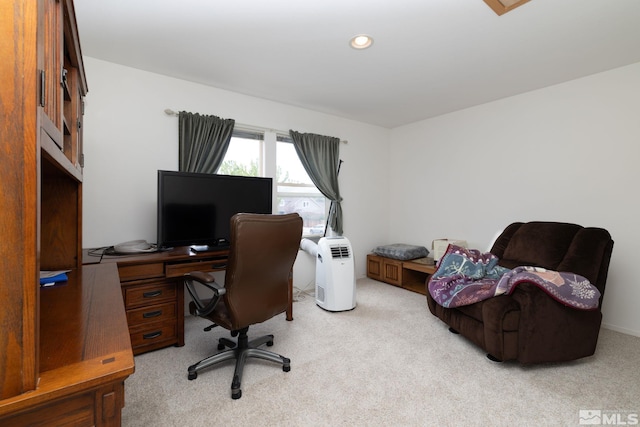 office space with light carpet and recessed lighting
