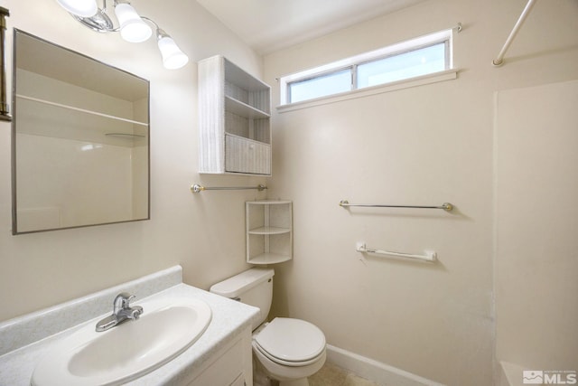 full bathroom with vanity, toilet, and a shower