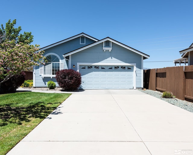 ranch-style home featuring driveway and a garage