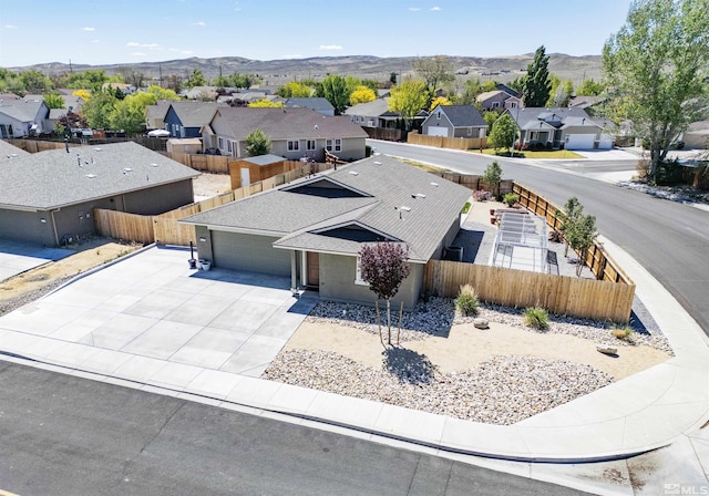 aerial view of residential area with a mountain backdrop