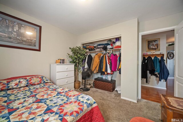 carpeted bedroom with a closet