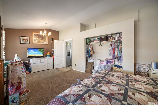bedroom featuring stainless steel fridge, carpet flooring, a chandelier, vaulted ceiling, and a closet