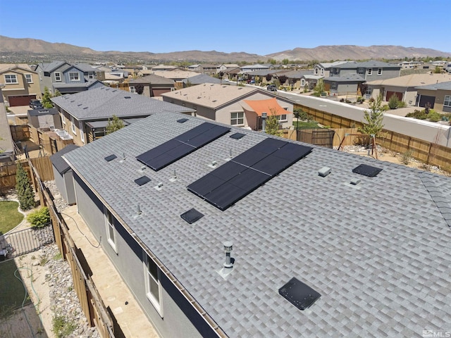 aerial perspective of suburban area with a mountain backdrop
