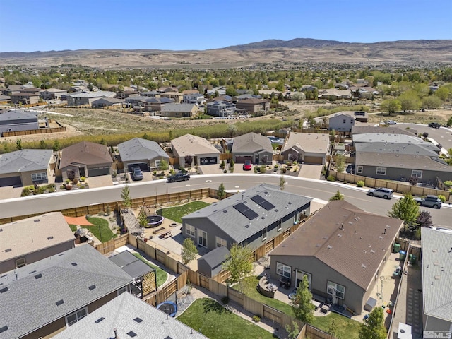 aerial perspective of suburban area featuring mountains