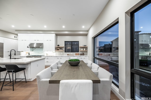 dining room featuring recessed lighting