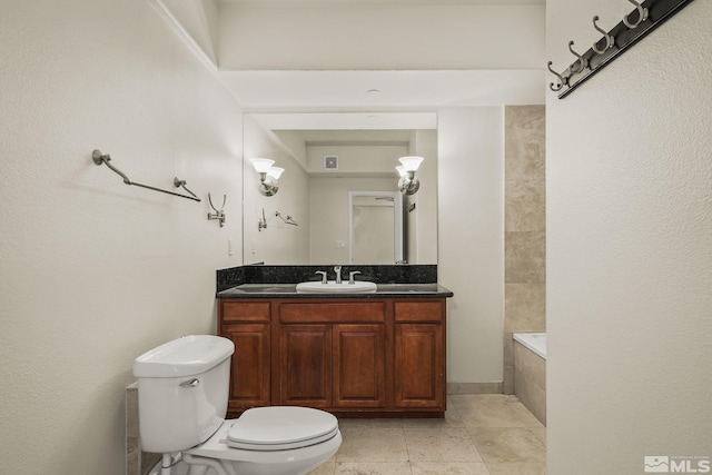 bathroom featuring toilet, vanity, tiled tub, a tile shower, and tile patterned flooring