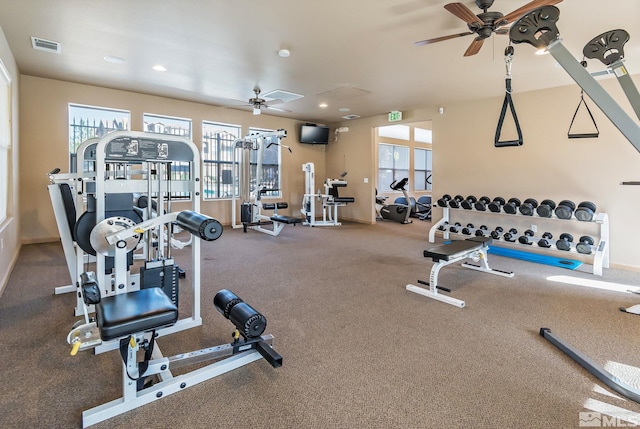gym featuring ceiling fan, healthy amount of natural light, and recessed lighting