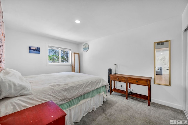 bedroom featuring carpet floors, baseboards, and recessed lighting