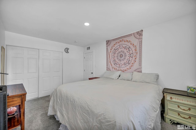 bedroom with carpet floors, a closet, and recessed lighting