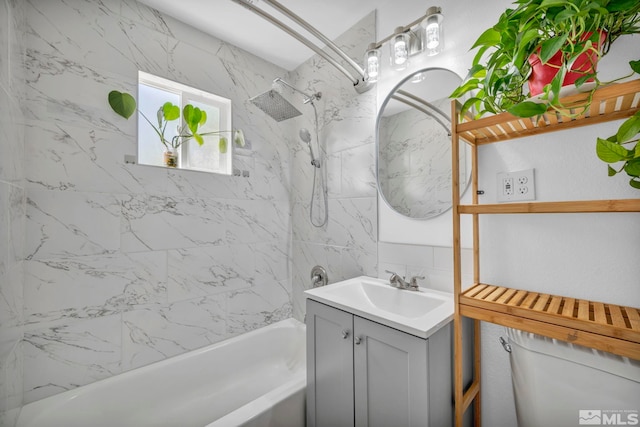 bathroom with vanity and bathtub / shower combination