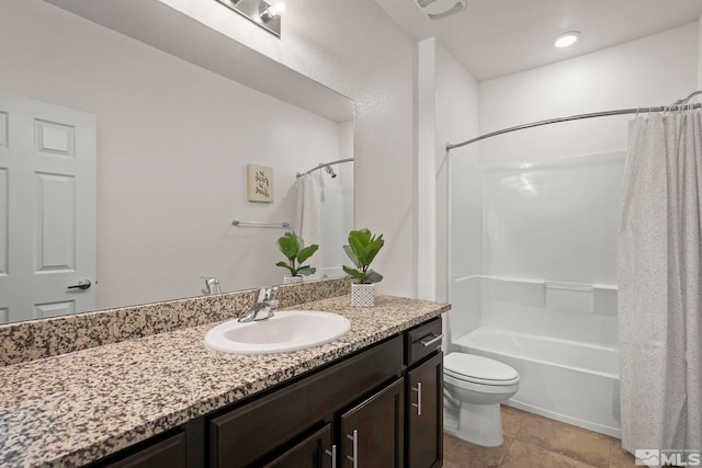 bathroom with toilet, vanity, and shower / tub combo with curtain
