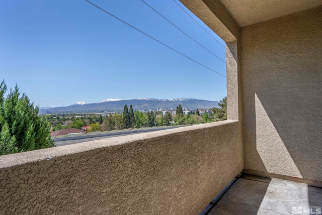 balcony featuring a mountain view