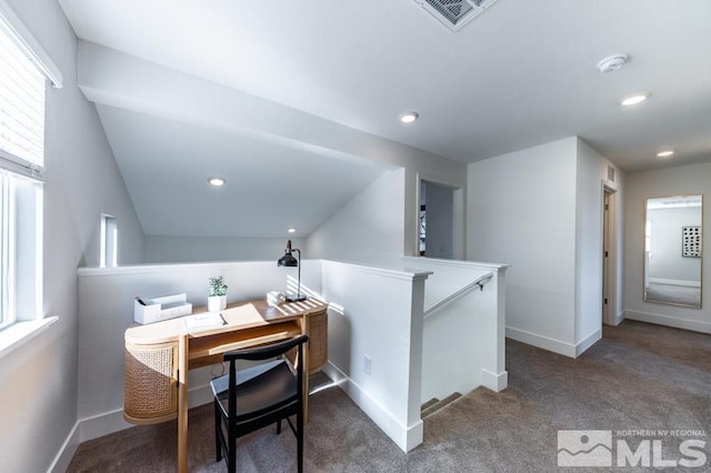carpeted office space with baseboards, recessed lighting, and vaulted ceiling