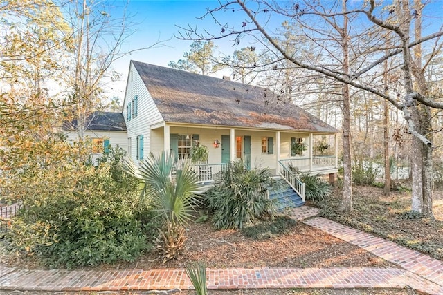 view of front of property featuring covered porch