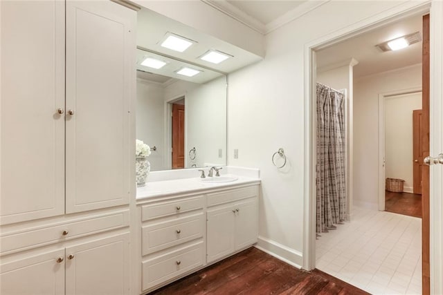 bathroom with tile flooring and large vanity