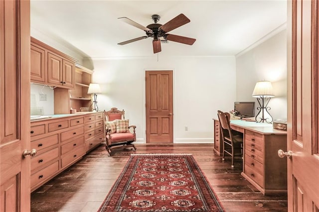 office area with ornamental molding, ceiling fan, and dark hardwood / wood-style floors