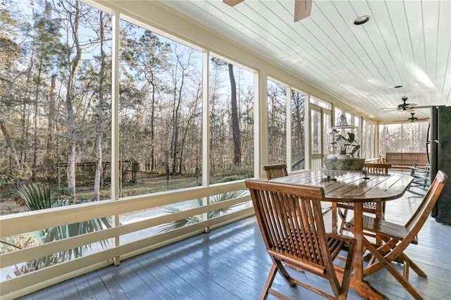 sunroom / solarium with ceiling fan