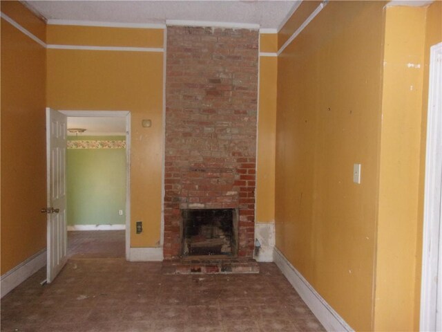 3729 Annunciation St, New Orleans, LA 70115 - unfurnished living room with brick wall, a brick fireplace, and ornamental molding