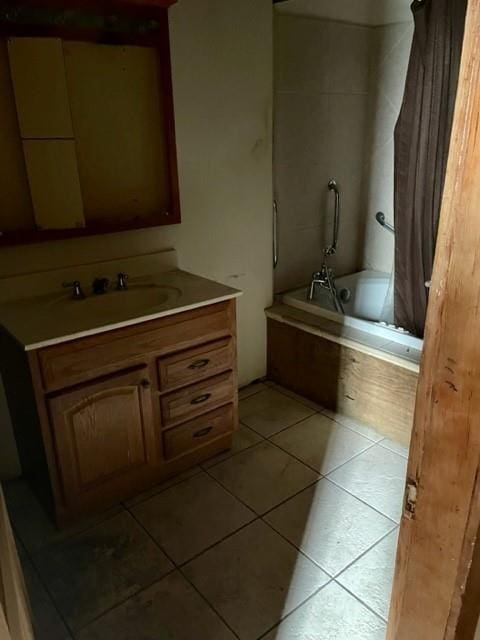 bathroom with oversized vanity and tile flooring