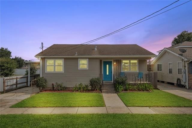 view of front of home featuring a yard