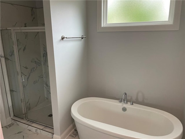 bathroom with tile flooring and an enclosed shower