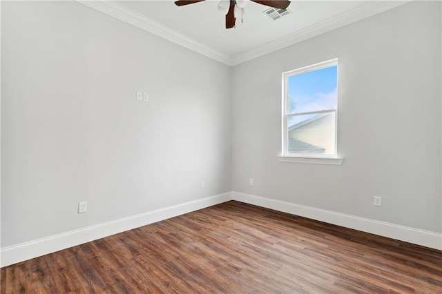 unfurnished room featuring dark hardwood / wood-style flooring, ceiling fan, and ornamental molding