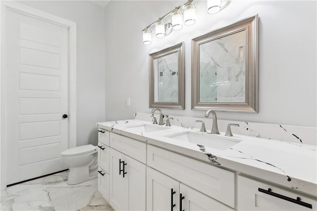 bathroom with toilet, dual vanity, and tile floors