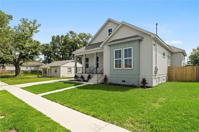 view of front facade featuring a front yard