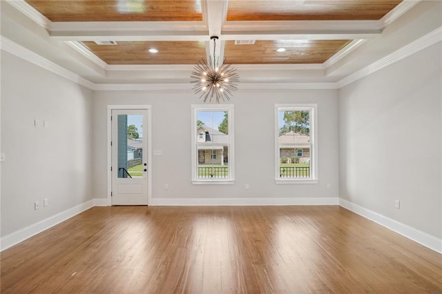 unfurnished room featuring wood ceiling, light hardwood / wood-style flooring, ornamental molding, and a chandelier