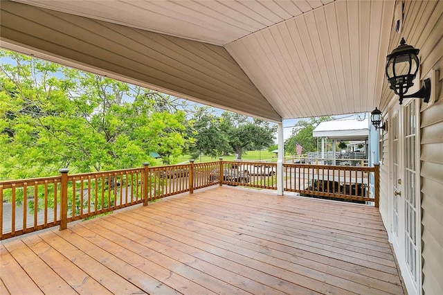 wooden deck with a gazebo