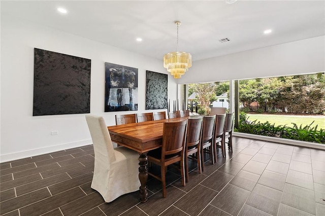 dining room featuring a chandelier