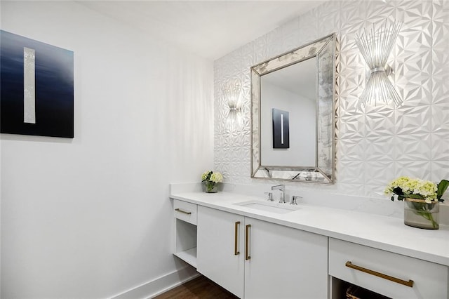 bathroom with vanity with extensive cabinet space