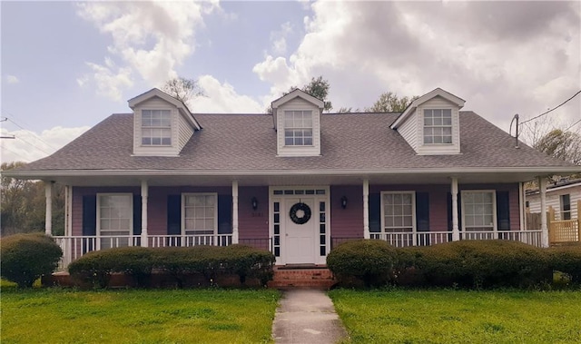 view of front of house featuring a porch and a front yard