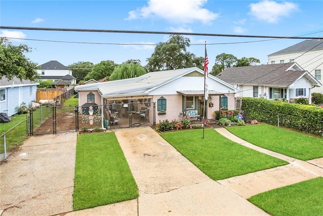 bungalow-style house featuring a front yard