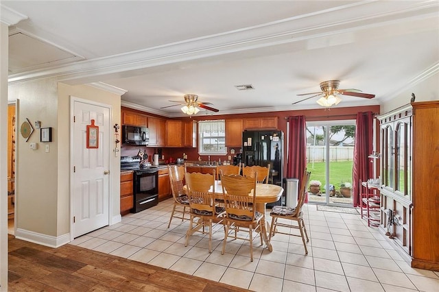 dining room with light tile floors, ceiling fan, and crown molding