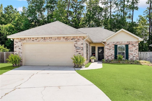 ranch-style home featuring a front yard and a garage