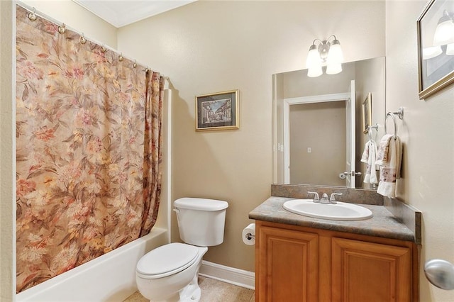 full bathroom featuring toilet, vanity with extensive cabinet space, and shower / tub combo