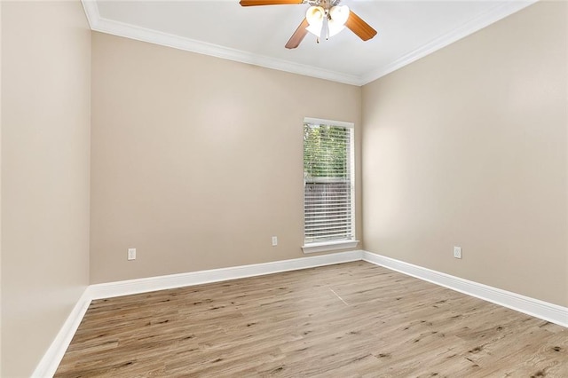 spare room with ceiling fan, crown molding, and light hardwood / wood-style floors