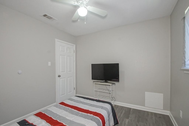 bedroom featuring ceiling fan and hardwood / wood-style floors