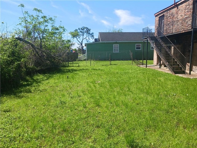 view of yard with a wooden deck