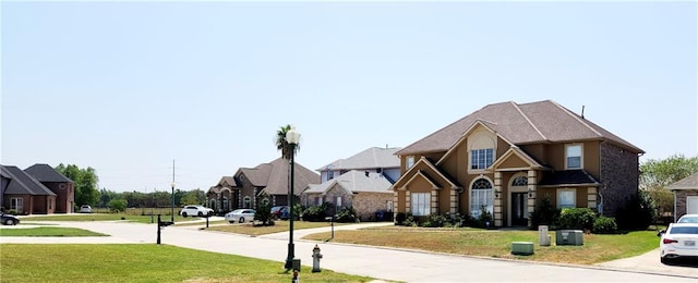 view of front of home featuring a front lawn