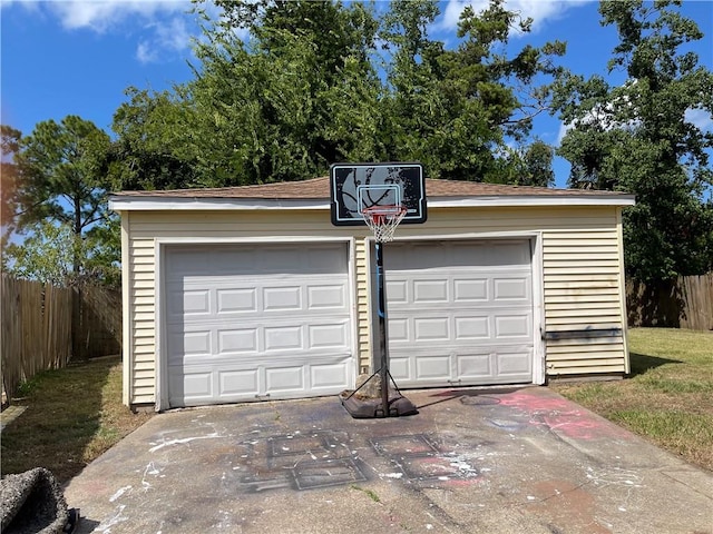 garage with a yard