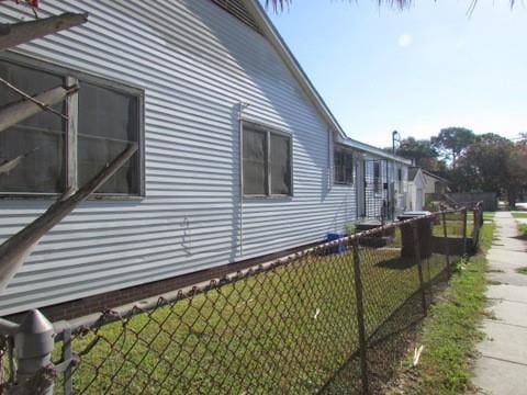 3701 Elysian Fields Ave, New Orleans, LA 70122 - view of home's exterior featuring a lawn
