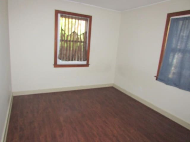 3701 Elysian Fields Ave, New Orleans, LA 70122 - spare room with dark hardwood / wood-style floors